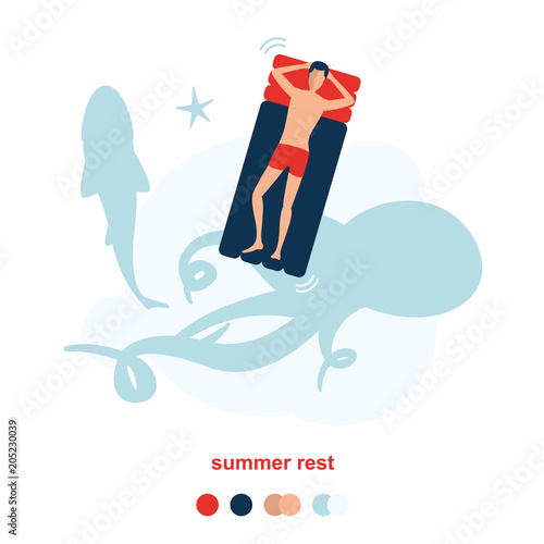 Man resting on a floating rubber inflatable raft on the sea. And swims over a big octopus, fish and starfish. photo