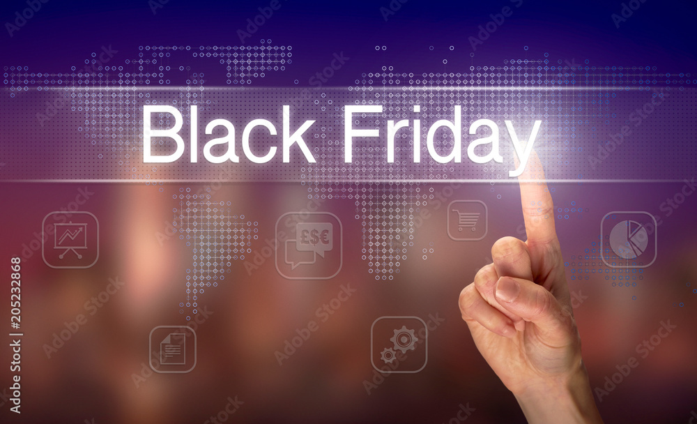 A hand selecting a Black Friday business concept on a clear screen with a colorful blurred background. A hand selecting a Black Friday business concept on a clear screen with a colorful blurred background.