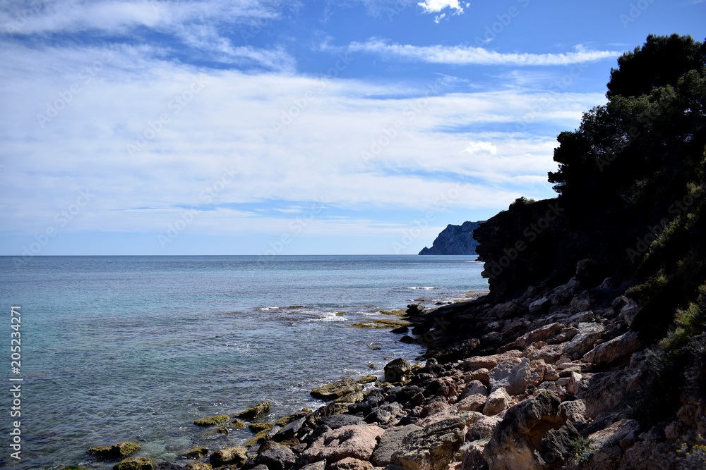 Beautiful view of Spanish coast line of Costa Blanca with blue sky background Beautiful view of Spanish coast line of Costa Blanca with blue sky background