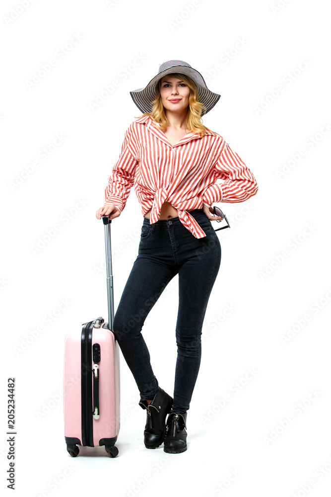 Photo of blonde in hat with tourist suitcase Photo of blonde in hat with tourist suitcase