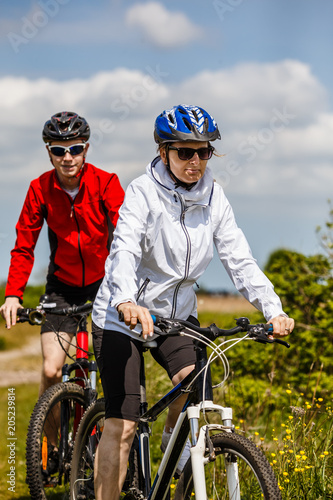 Healthy lifestyle - people riding bicycles