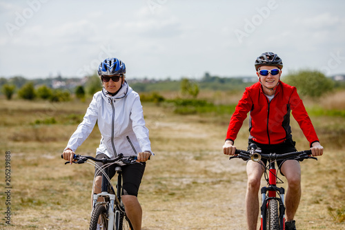 Fototapeta Naklejka Na Ścianę i Meble -  Healthy lifestyle - people riding bicycles