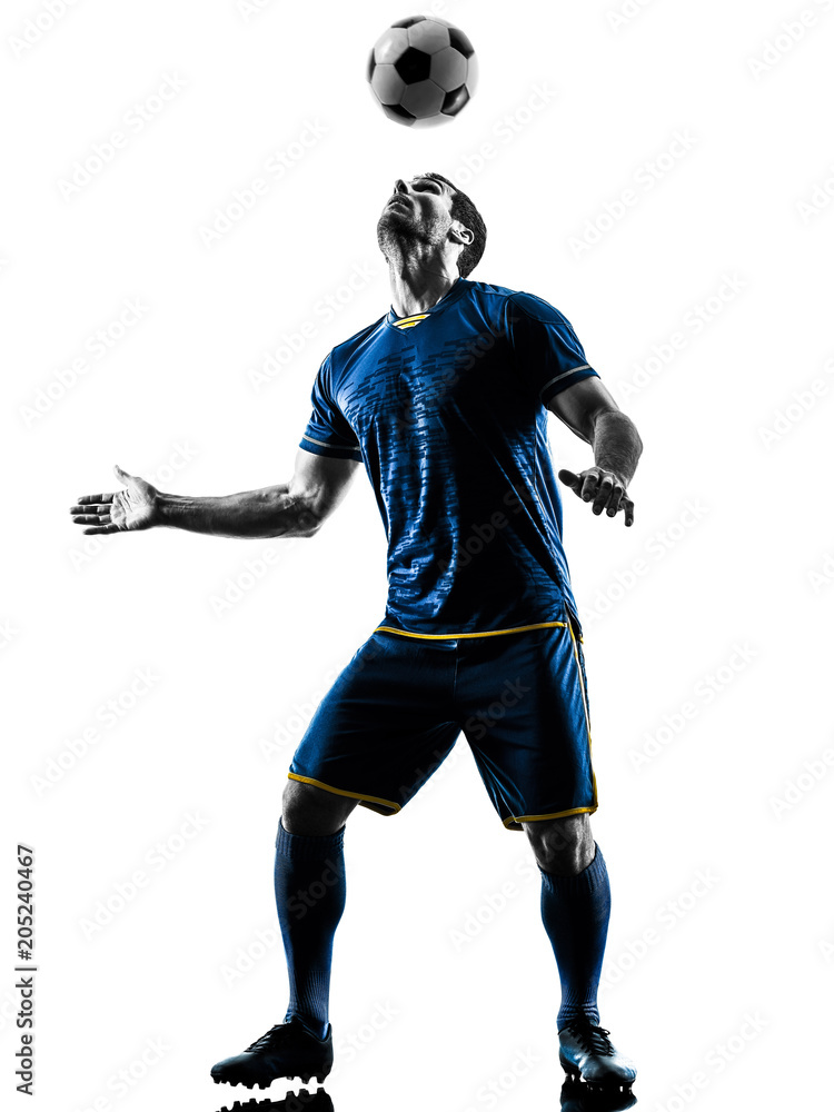 one caucasian soccer player man playing in silhouette isolated on white background one caucasian soccer player man playing in silhouette isolated on white background