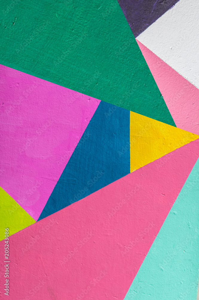Naklejka premium Geometryczne tło ściany w jasnych kolorach. styl pop-art