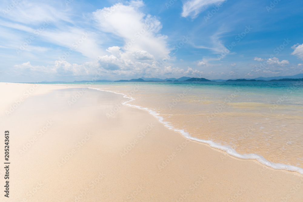 Empty tropical beach background. Horizon with sky and white sand at Kang Kao Island,Andaman sea :Ranong Thailand. Day light blue sky