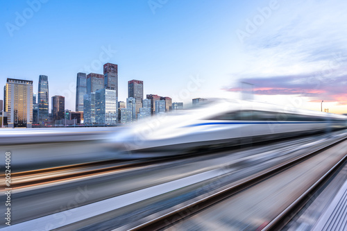 high speed train with panoramic city skyline in beijing china