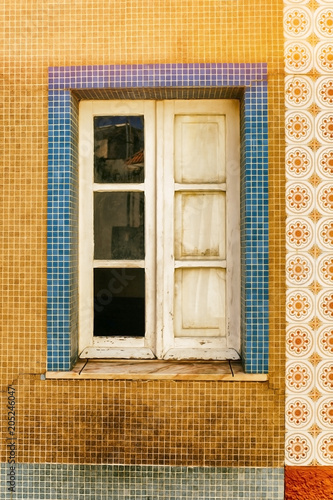 old colorful gresite facade, algarve-portugal photo