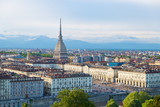 Turin skyline at sunset, Torino, Italy, panorama cityscape with the Mole Antonelliana over the city. Scenic colorful light and dramatic sky.