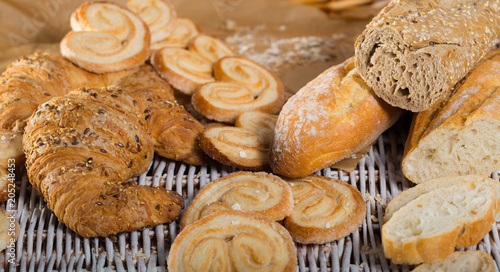 Various kinds of bread and  bakery products on table