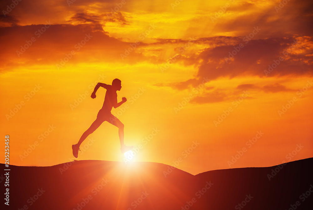 man running at sunset