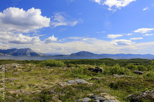 Cycling on the island of Ylvingen a great summer day,Northern Norway