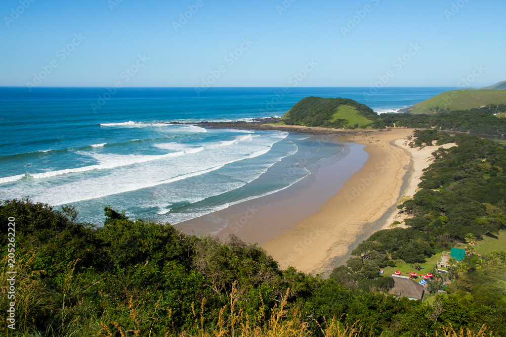 Beach of Coffee Bay on the Wild Coast in Eastern Cape, South Africa, as seen from the top of a cliff