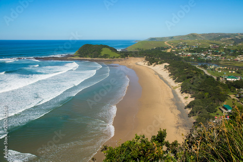 Beach of Coffee Bay on the Wild Coast in Eastern Cape, South Africa, as seen from the top of a cliff photo