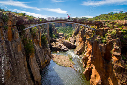 Bridge over Bourke's Luck Potholes geological formation in the Blyde River Canyon area, Mpumalanga district, South Africa photo