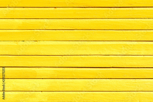 Yellow painted wooden background, texture or wall