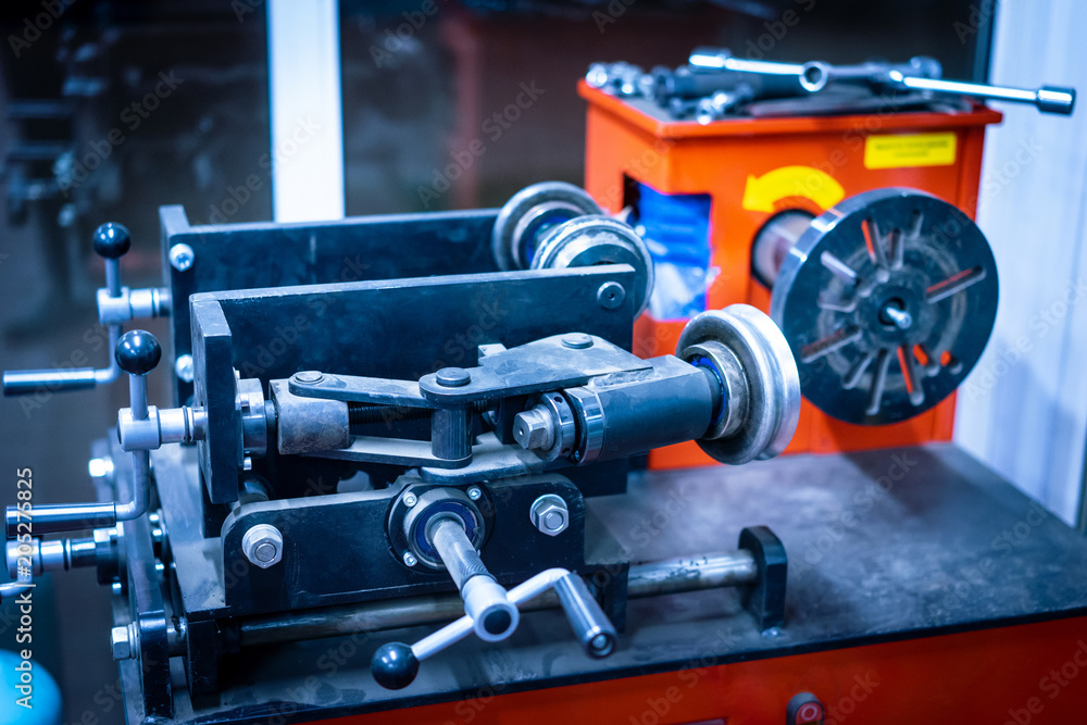 Repair of wheels. Machine for repairing wheel disks. Edit curved wheels. Equipment for auto workshop. Repair of wheel disks of a motor vehicle. Repair of wheels. Machine for repairing wheel disks. Edit curved wheels. Equipment for auto workshop. Repair of wheel disks of a motor vehicle.