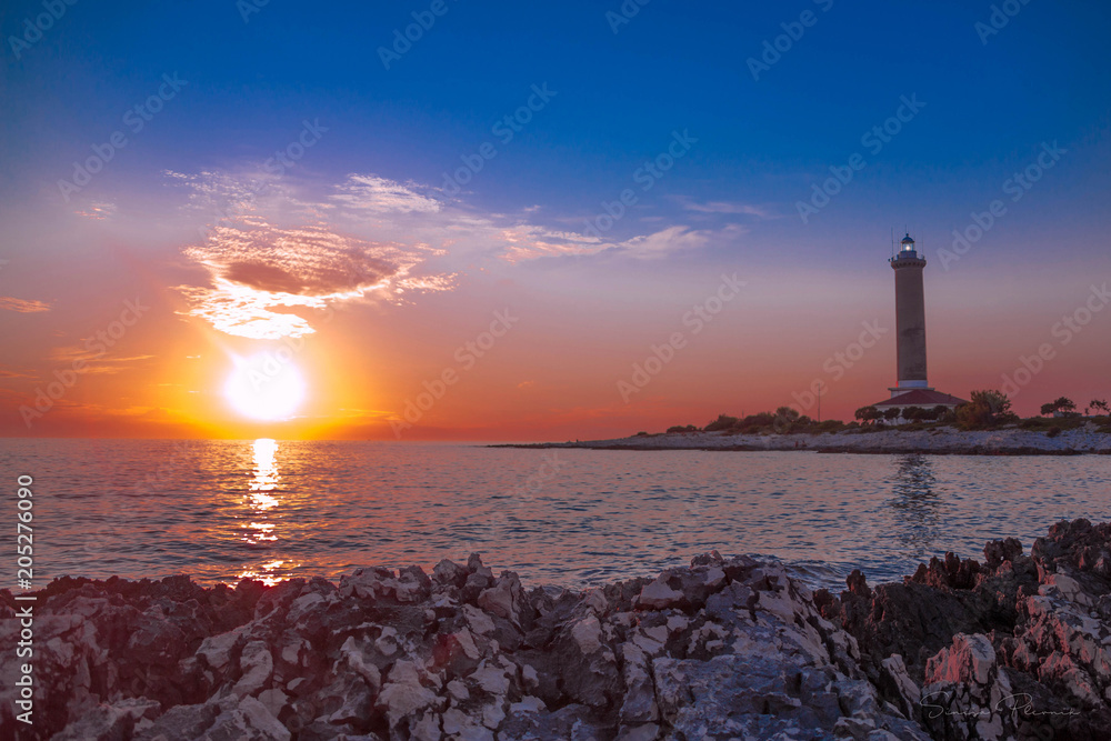 Lighthouse at sunset sea beach sun summer