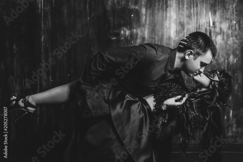 Elegant couple passing in classic clothes. Close up, cut shoot