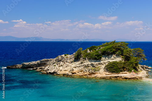 The beautiful coast of the Mediterranean sea near Kokkari village, Samos island, Greece.