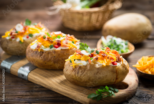 Baked potatoes with cheese and bacon