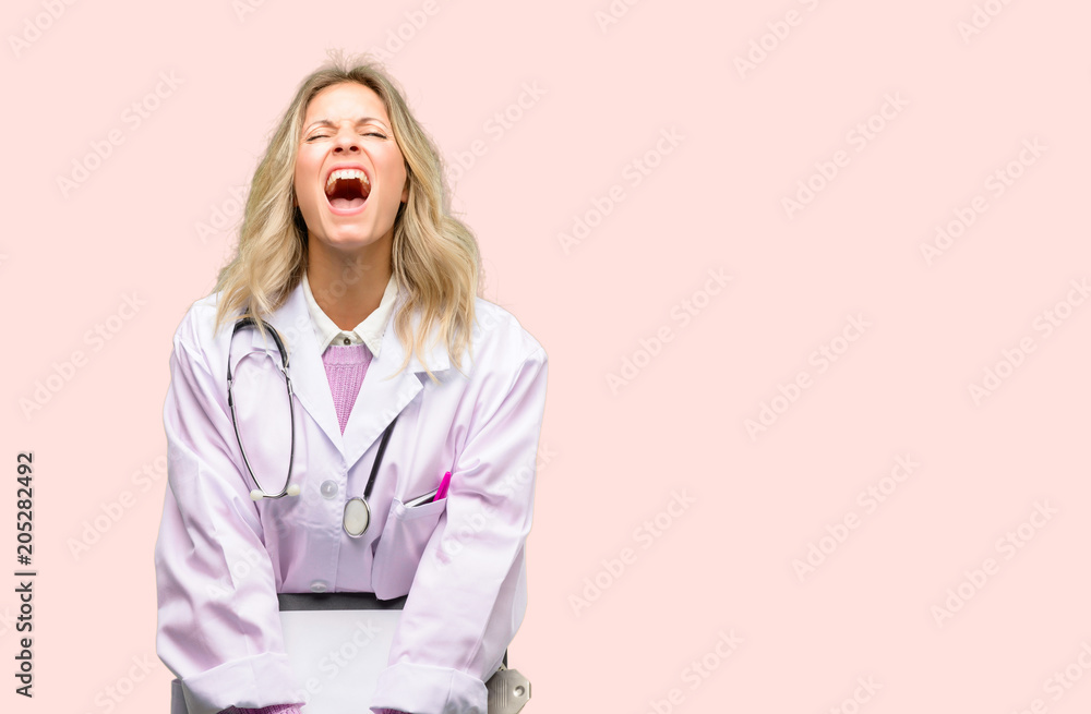 Young doctor woman, medical professional stressful, terrified in panic, shouting exasperated and frustrated. Unpleasant gesture. Annoying work drives me crazy Young doctor woman, medical professional stressful, terrified in panic, shouting exasperated and frustrated. Unpleasant gesture. Annoying work drives me crazy