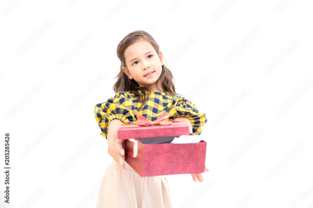 Young girl give suprise gift. Young cute white girl giving a gift present box, looking cute. Isolated in white. Birthday and family concept. Young girl give suprise gift. Young cute white girl giving a gift present box, looking cute. Isolated in white. Birthday and family concept.