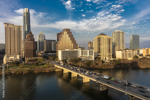 MARCH 2, 2018, AUSTIN, TEXAS - Austin Cityscape Evening Skyline with skyscrapers down Congress Avenue Bridge over Colorado River