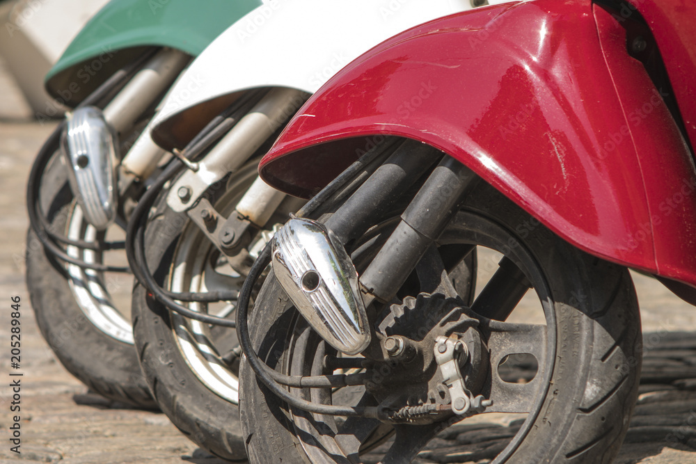 three mopeds painted in colors of the Italian flag three mopeds painted in colors of the Italian flag