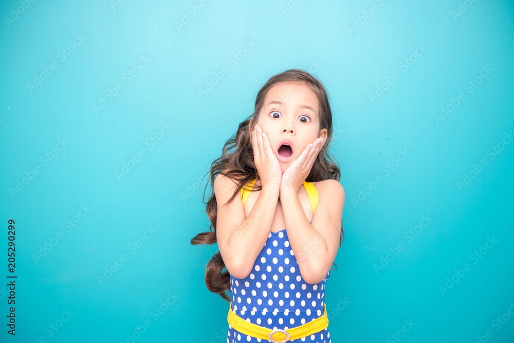 Young girl isolated white. Pretty early teenage girl portrait. Happy surprise face pose. Young girl isolated white. Pretty early teenage girl portrait. Happy surprise face pose.