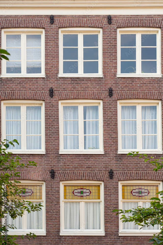Brick wall with windows in Amsterdam