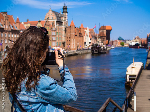 Young woman taking pictures 