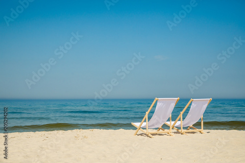Fototapeta Naklejka Na Ścianę i Meble -  Deck chairs on beach
