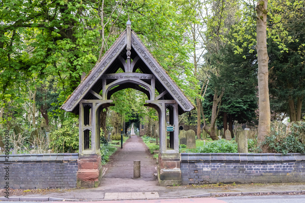 A nice walkway lead to a church cemetery A nice walkway lead to a church cemetery