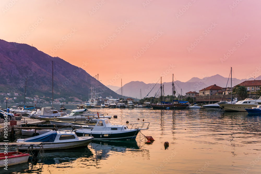 Beautiful Kotor bay and Kotor cityscape at dusk with marina and