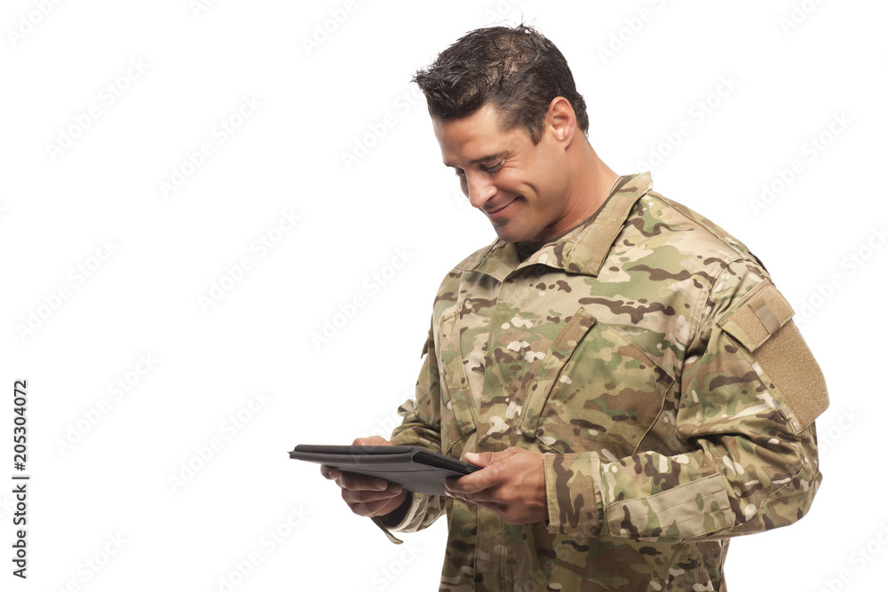 Smiling Soldier with digital tablet