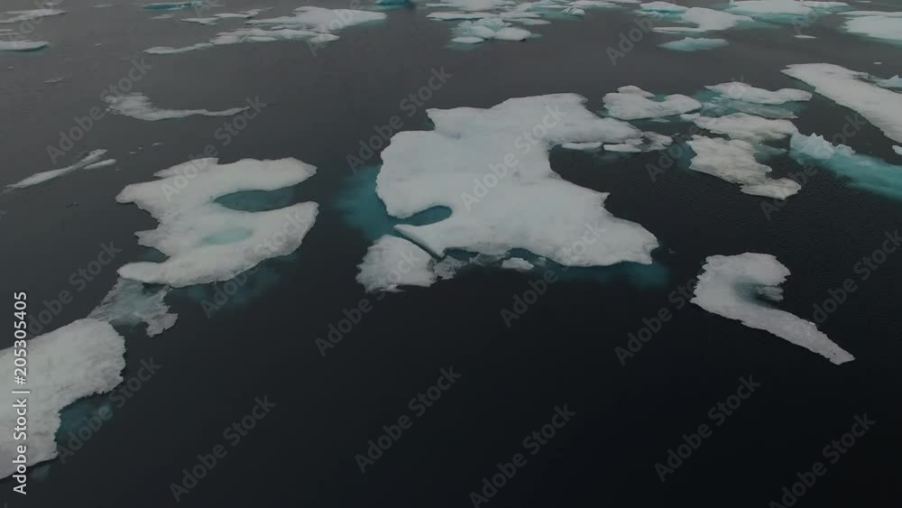 Cruise Ship transiting the Northwest Passage, surrounded by a Canadian Icefield Cruise Ship transiting the Northwest Passage, surrounded by a Canadian Icefield