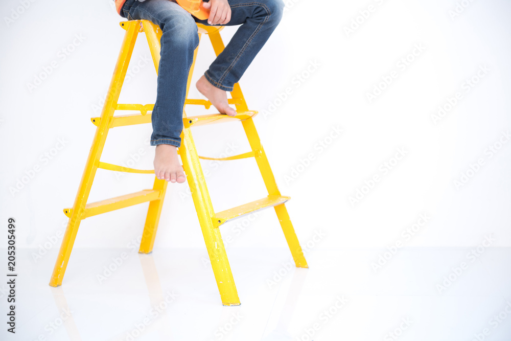 Young boy engineer isolated in white. Handsome early teenage boy portrait with engineering cloth. Confident look pose. Young boy engineer isolated in white. Handsome early teenage boy portrait with engineering cloth. Confident look pose.