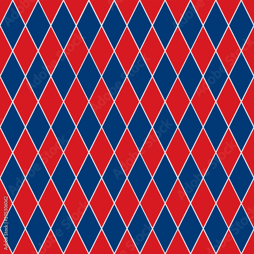 Seamless harlequin pattern background in red and blue.