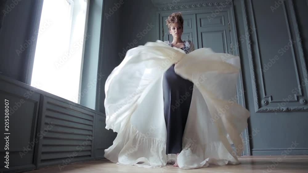 Fashionable female portrait of cute lady in dress indoors Fashionable female portrait of cute lady in dress indoors