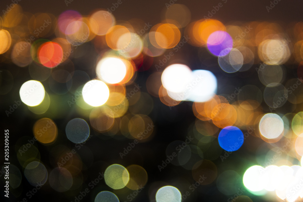 Blurred street bokeh lights at night time Blurred street bokeh lights at night time