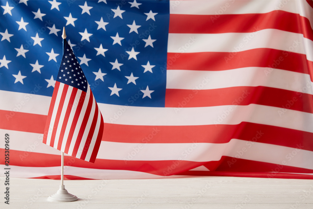 Fototapeta premium closeup view of united states of america flagpole and flag