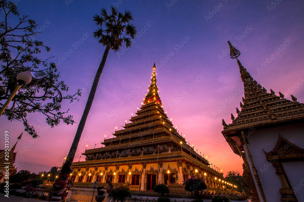Naklejka premium Colorful light blue evening. Wat Phra That Kaen Nakorn or Wat Nong Wang. It is a beautiful temple in Khon Kaen. It is attractive to tourists to visit the beauty. In the Northeast of Thailand.
