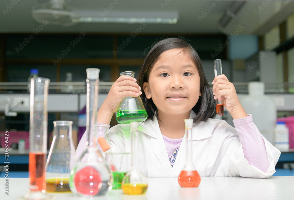 little scienctist making experiment in laboratory, little scienctist making experiment in laboratory,