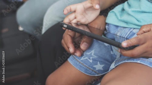 Wallpaper Mural Close Up Slow Motion Shot Of A Little Boys Hands Playing With His Mother's Smart Phone While Sitting On Her Lap. Torontodigital.ca