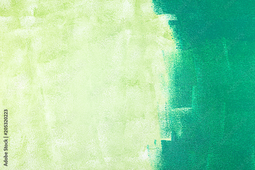Ταπετσαρία unfinished painted wall with green color by paint roller