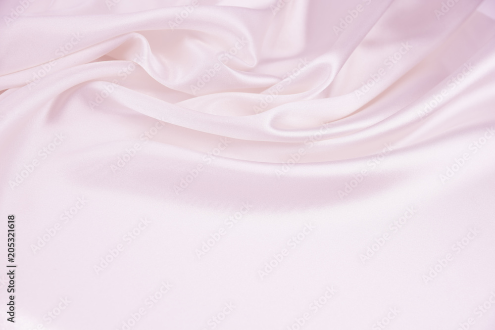 Obraz premium The texture of the satin fabric of pink color for the background