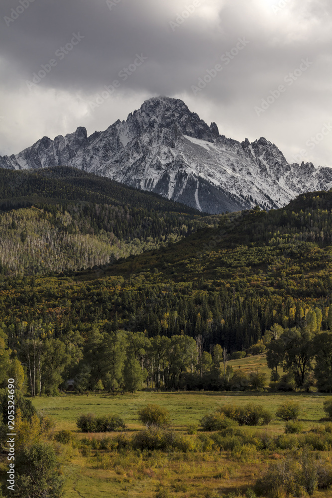 Early autumn color leads to Mount Sneffels and San Juan Mountains in Autumn, outside Ridgway, Colorado