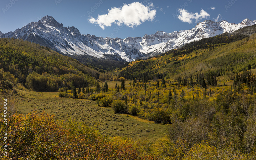 Autumn color leads to Mount Sneffels and San Juan Mountains in Autumn, outside Ridgway, Colorado