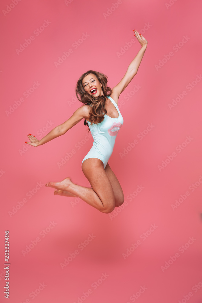 Full length portrait of a cheerful young woman Full length portrait of a cheerful young woman