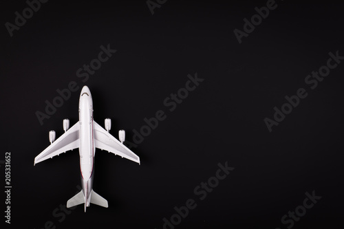 white airplane on a black isolated background